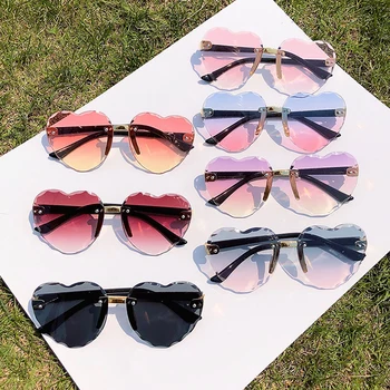 

2020 Kids Girls Rimless Gradual Sunglasses Metal Candy Heart-shaped Glasses Brand Designer Fashion Children Mirror Kids Sunglass