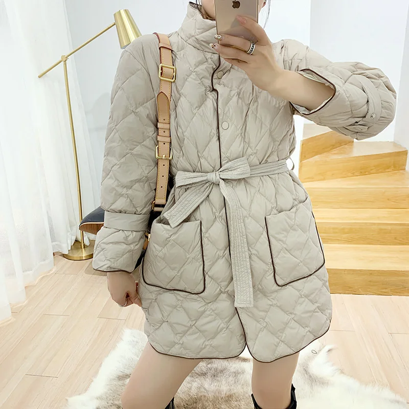 YNZZU Korean Style Spring Winter Mid-Long Light Women's Down Jacket Elegant White Duck Down Coat with Sashes Pockets A1391