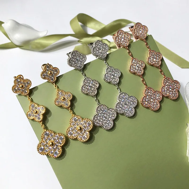 

Fashion accessories exquisite copper earrings four-leaf clover inlaid ochre earrings personality to send lover gift 2019 new hot