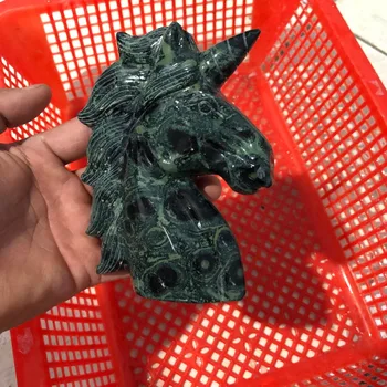 

Horsehead unicorn sculpture quartz crystal skull of a natural peacock eye sculpture