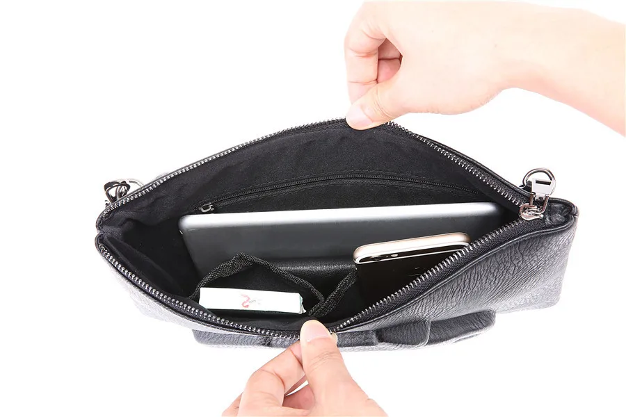 Personality pattern three-dimensional street leather wrist bag Korean version of fashionable men's hand bag