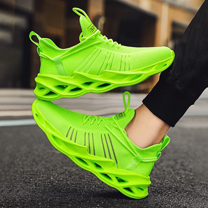 Premium Photo | Trendy green neon sneakers Sports shoes with neon glow on a  dark background