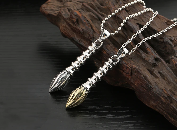 

990 silver and gold list title brush pendant