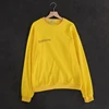 yellow sweatshirt
