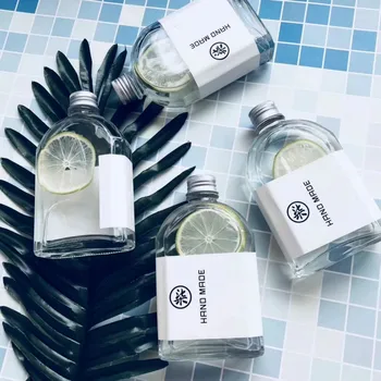 

350ml Ins New Juice Drink Bottle Cafe Takeaway Milk Tea Bottle Flat Wine Bottle Thickened Oblique Flat Glass Bottle