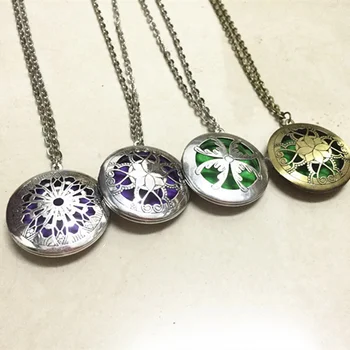 

Wholesale Antique Silver Vintage Color Essential Oil Diffuser Filigree Locket Necklace with Diffuser pads