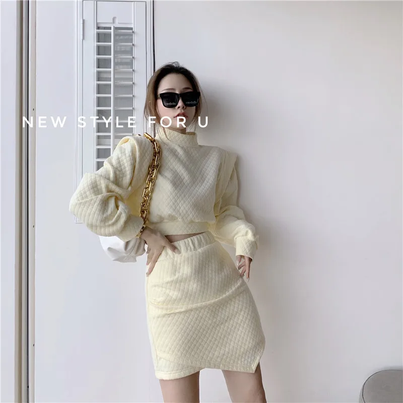 

2020 autumn and winter new stand collar fashion temperament slim slimming knitted top + skirt two-piece suit women