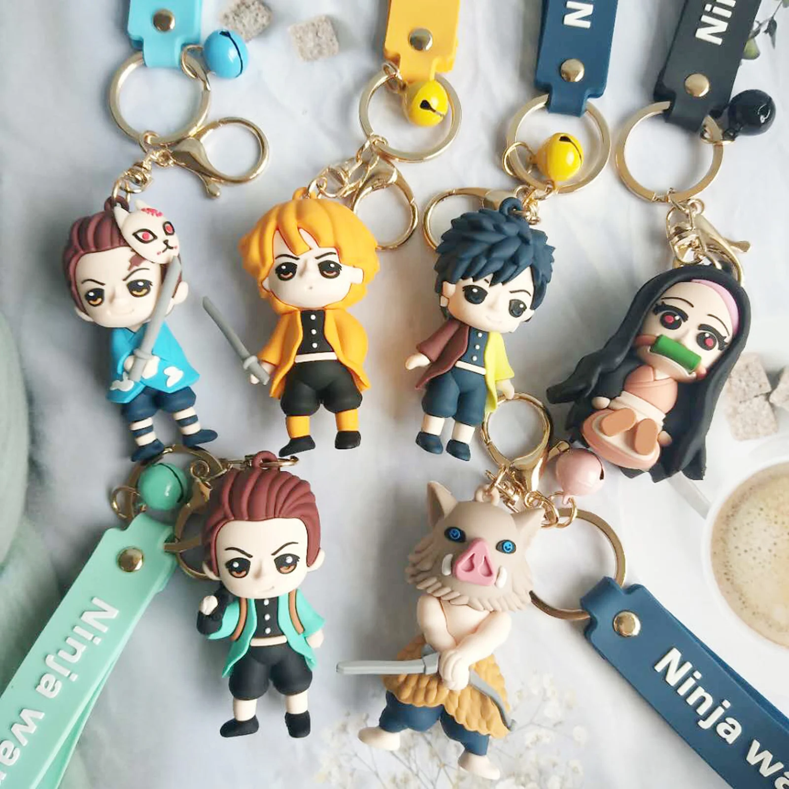 

Demon Slayer Kimetsu No Yaiba Nezuko Zenitsu Tanjirou Giyuu Inosuke Kyoujurou Action Figure Model Cake Figurine Keychain