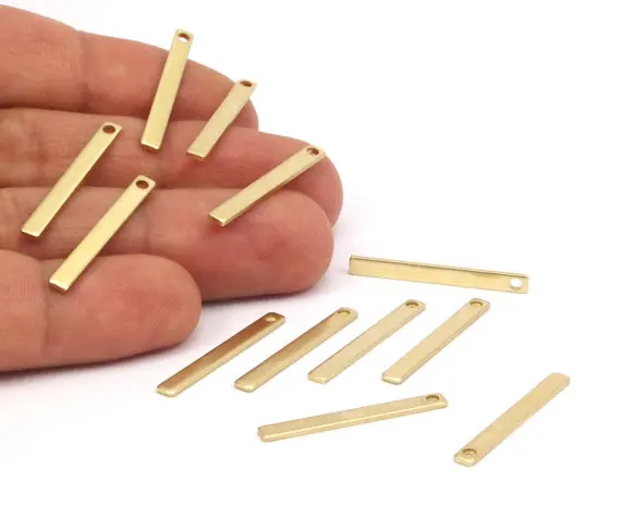 

30pcs Raw Brass Bars. size (28x3x1mm). BRC 155