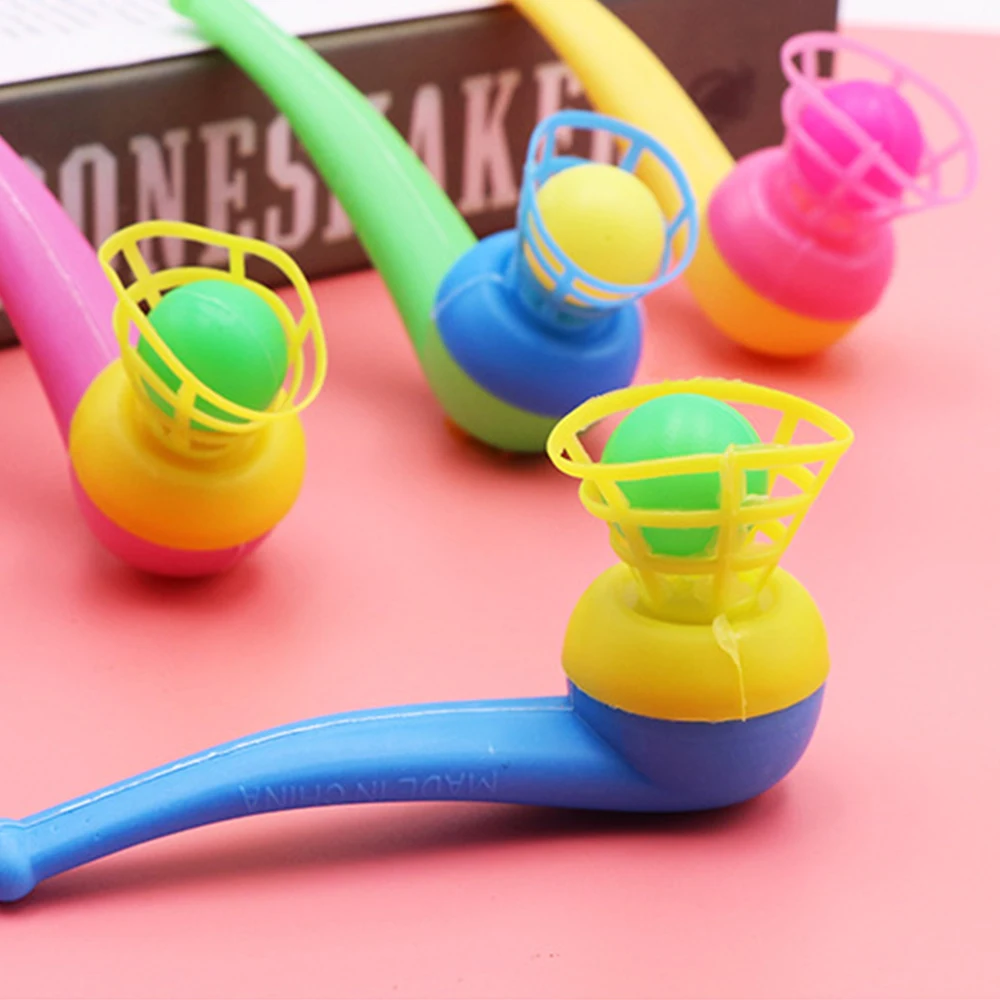 Pipa de soplado y Bolas de plástico para niños, juguete de fiesta con silbato de plástico, color aleatorio, 1 unidad