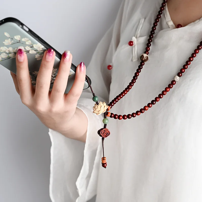 

Small leaf red sandalwood long phone chain handmade Chinese style lotus phone lanyard hanging chain mobile phone shell pendant