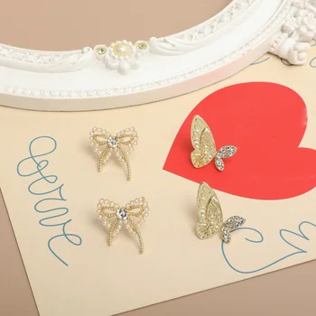 

4pcs Super fairy simple wild rhinestone imitation pearl bowknot DIY alloy earrings earrings accessories material