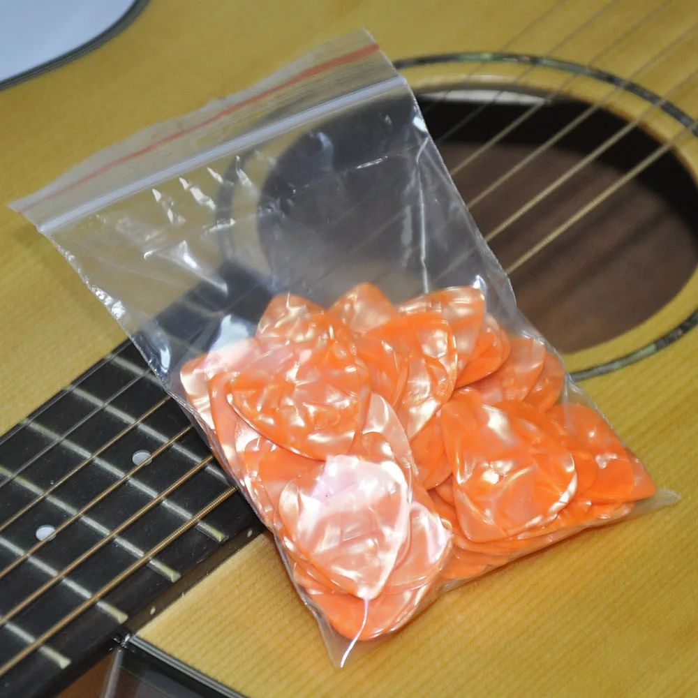 0.46mm 0.71mm Orange Pearl Celluloid Guitar Picks Plectrums 100pcs/lot for Acoustic Electric Guitar Bass
