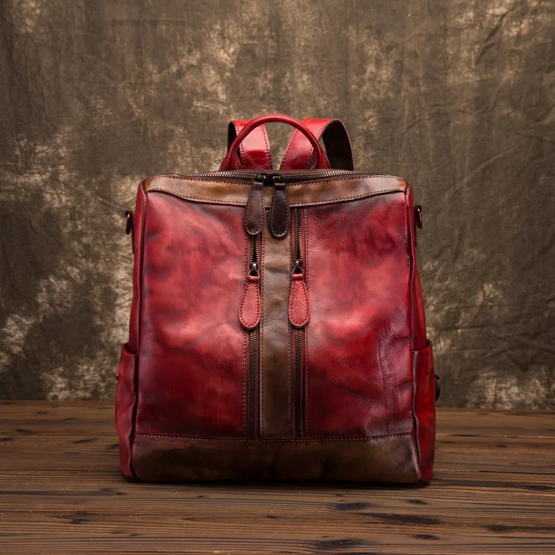 

The new factory direct fashion mosaic shoulder header layer of leather backpack leisure travel bag simple wild