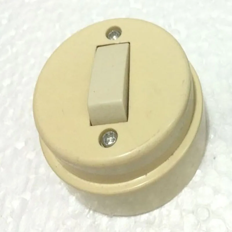 

Flat switch round surface mounted single open switch round old style flat switch