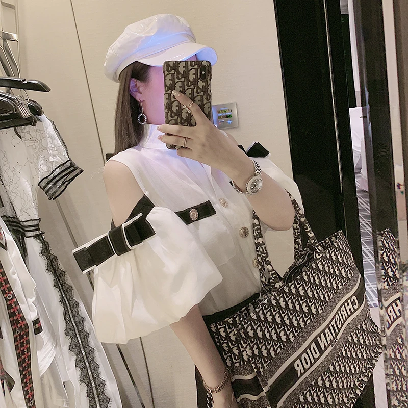 

2019 Summer New Joker Stand Collar Short Lantern Sleeve Shirt Women's Metal Button Off Shoulder White Shirt Blouse Loose Blusas