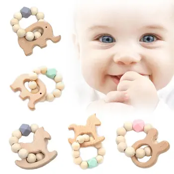 

Wooden Animal Teether Baby Silicone and Wood Teething Ring Photography Props
