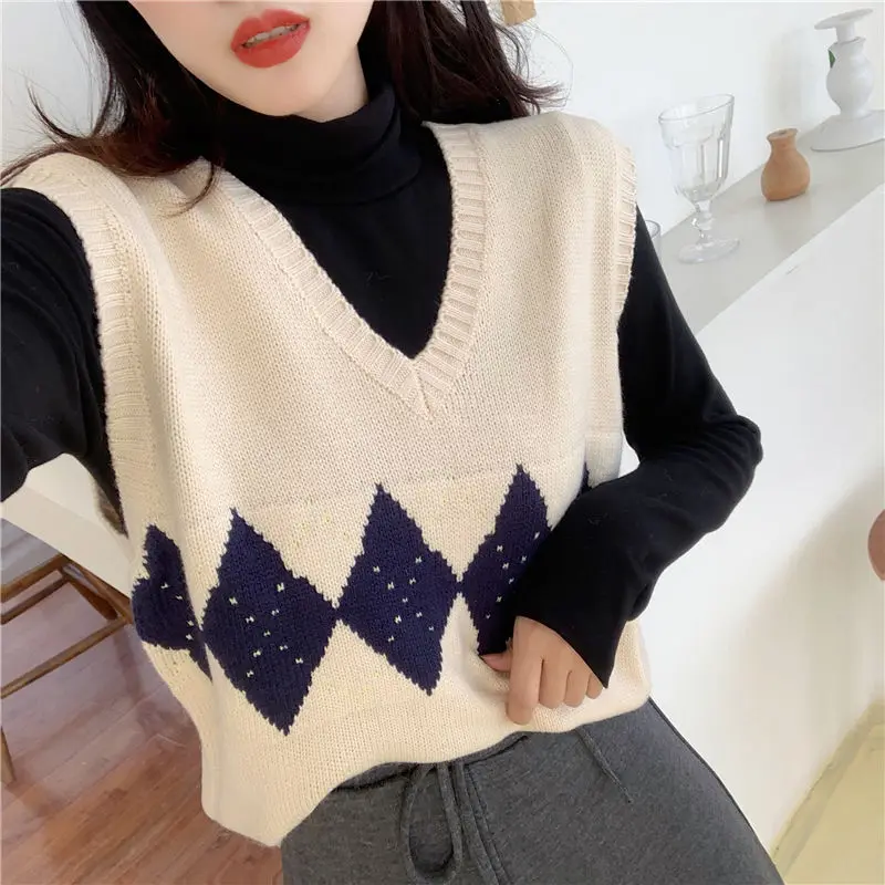 

Knitted vest women's vest 2020 spring and autumn Korean college style net red lazy v-neck loose pullover sleeveless sweater
