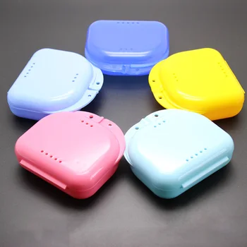 

Perforated tooth boxPerforated tooth box braces box box storage box color set random whitening molar tray denture tooth box F5D5