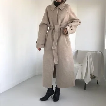 

Autumn and winter women's coat casual solid color belt decoration long coat