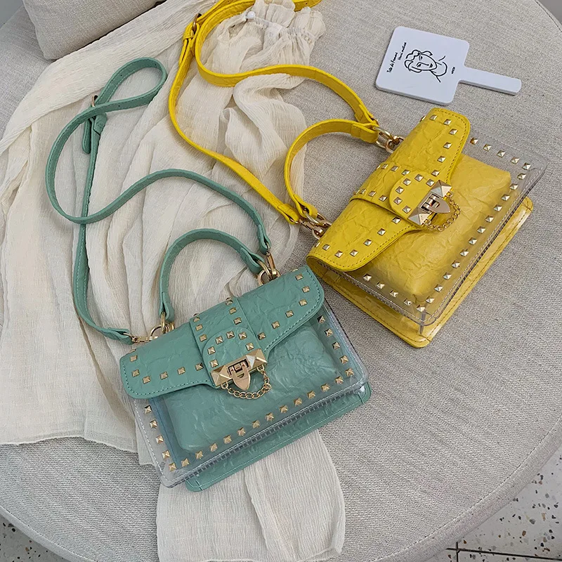 

Jelly bag, new style, new style, fashionable and transparent bag, rivet, hand-held messenger bag, one-shoulder bag.