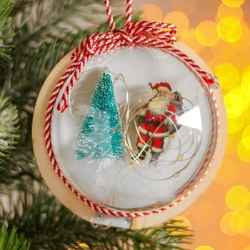 

Christmas ball with a wooden figure and lighting "Santa Claus and a lantern" 12x12 cm