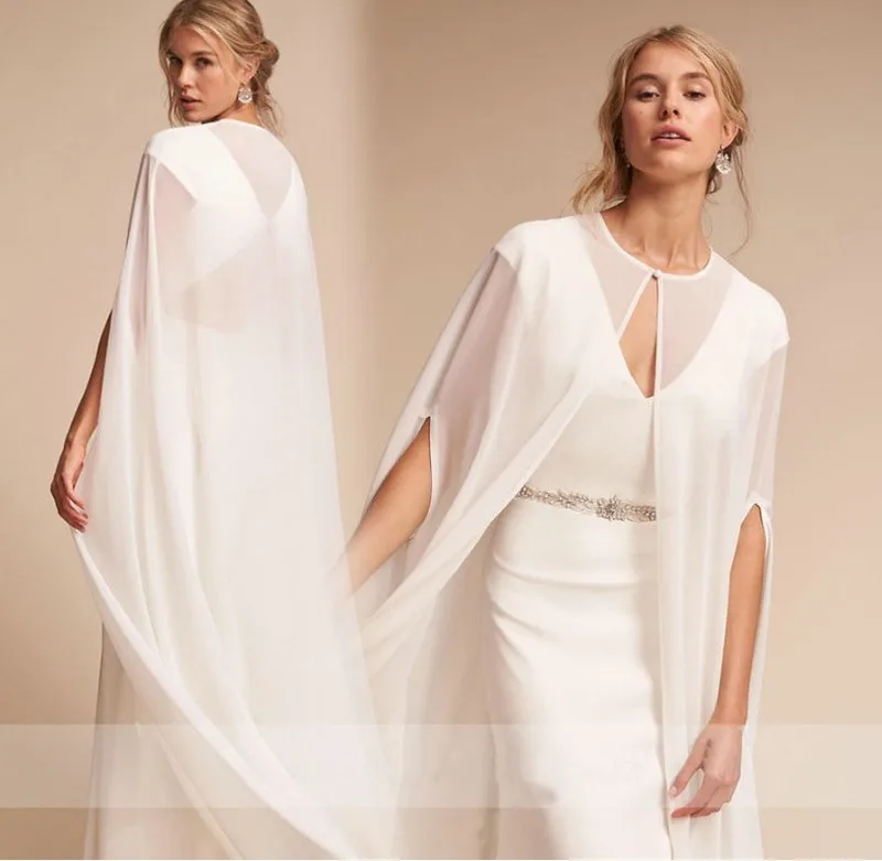 

A bridal cape with a large trailing net cape