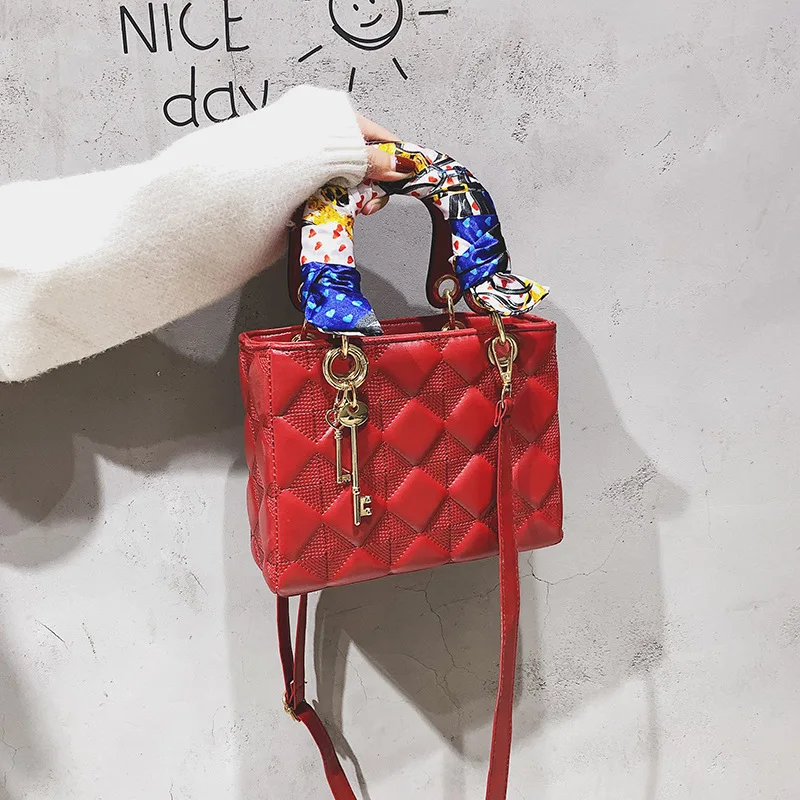 

Brand High Quality Designer women shoulder bucket tote tassel Messenger handbag PU leather Satchels Casual Classical style strap