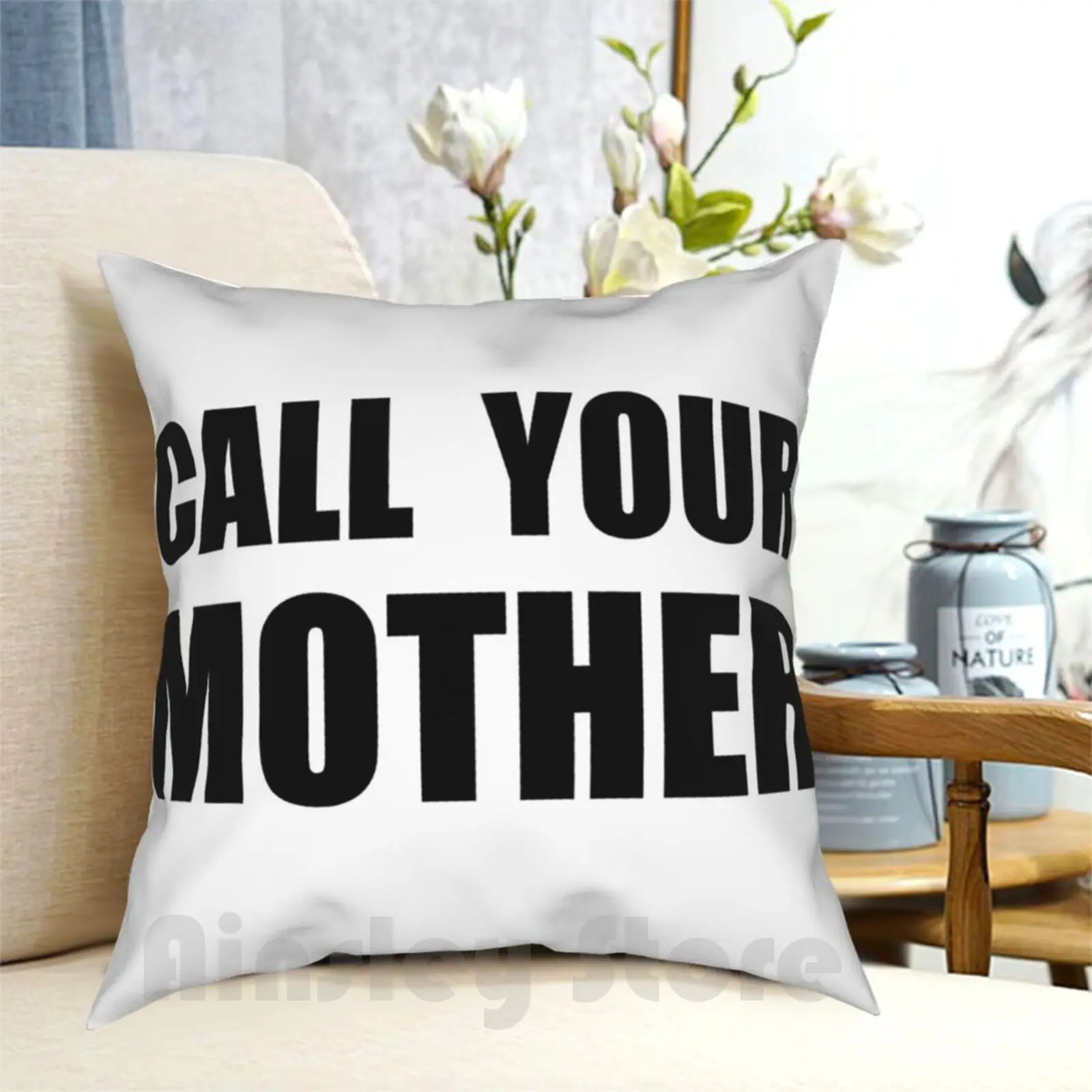 

Подушка с надписью «Call Your Mother»