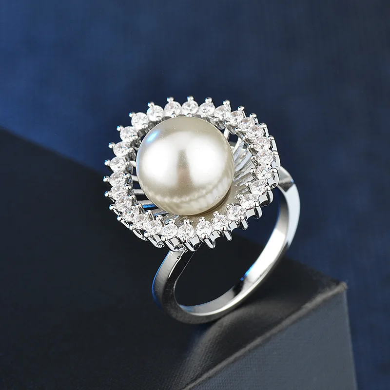 

Exquisite Women's Silver Colour Stainless Steel Ring Pearl Ring Hollow Flower Ring Cocktail Party Jewelry Wedding Ring Gift