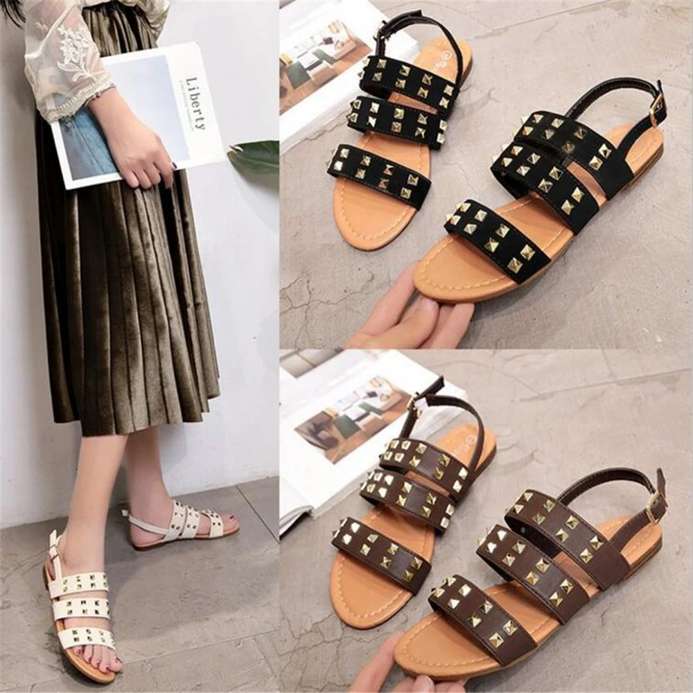 

Summer Women Flat Shoes Leopard Pointed Toe Ankle Strap Rivet Women Flat Sandals Designer Gladiator Shoes Zapatos Mujer y150