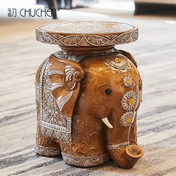 

Auspicious elephant shoe stool Creative table Room Resin decoration Handmade elephant small coffee table housewarming gift