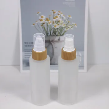 

60ml glass lotion pump bottle with bamboo lid , Nice touch, beautiful spray pump glass bottle