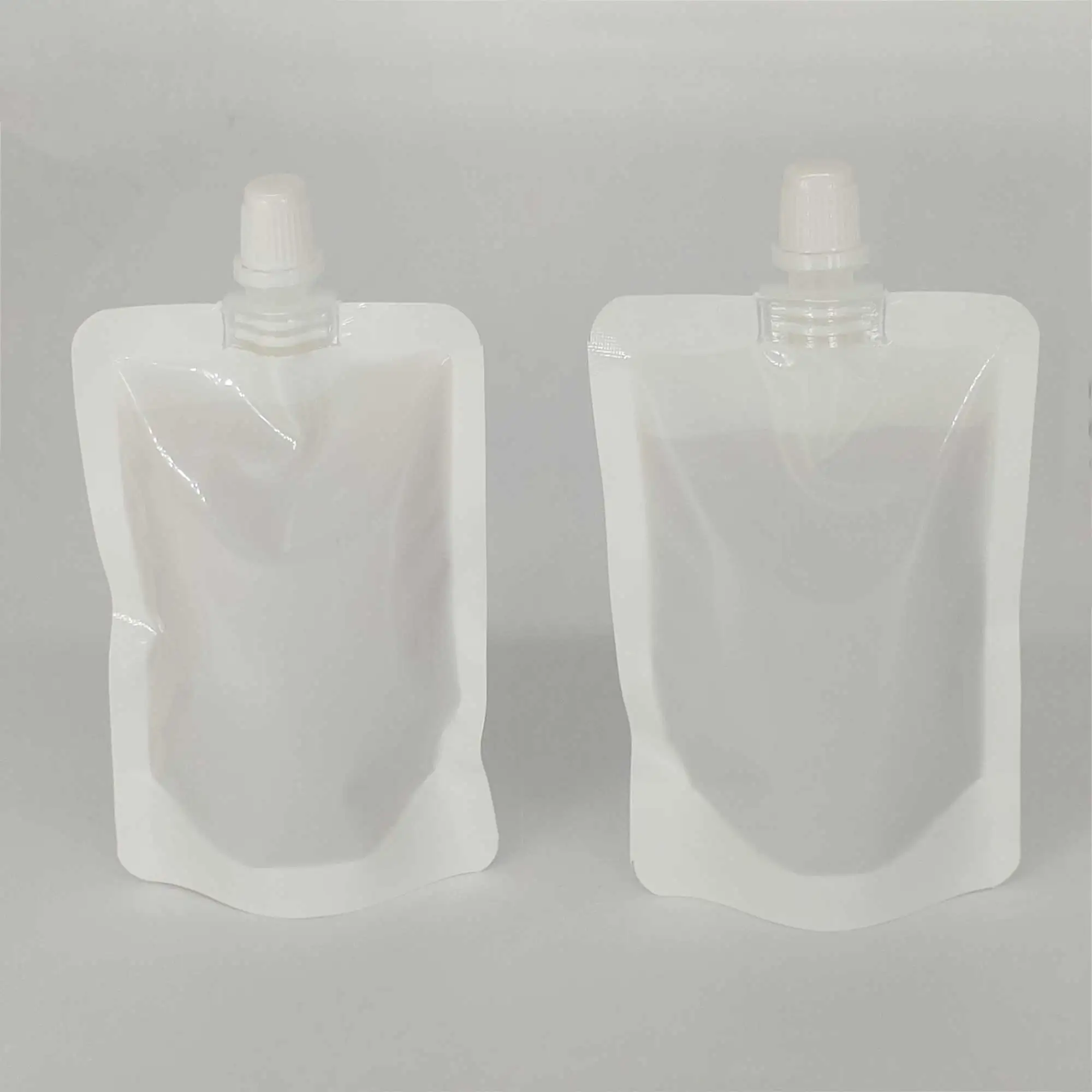 Eco-Friendly Stand-Up Spout Pouches with Free Funnel - 50 Pack Beverage Storage Bags for Camping and Outdoor Use