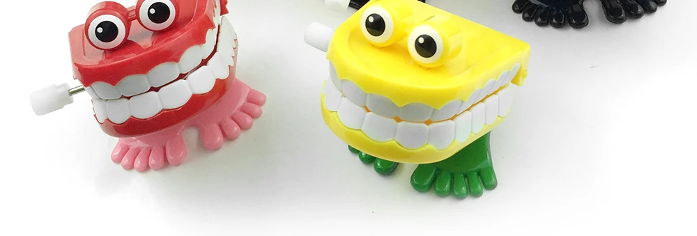 brinquedos atacado criativos dentais presente primavera plástico brinquedos pular dentes corrente para crianças brinquedos odontológicos