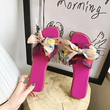 2021 kobiet klapki na lato słodkie dorywczo slajdy kolorowe drukowane Butterfly-Knot sandały na płaskim obcasie damskie buty wewnętrzne kapcie plażowe tanie i dobre opinie AsusuWei Niska (1 cm-3 cm) podstawowe Tkanina CN (pochodzenie) Na zewnątrz Płaskie z RUBBER LEISURE Dobrze pasuje do rozmiaru wybierz swój normalny rozmiar