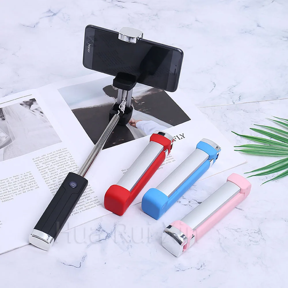 

Mini portable travel must be with aluminum telescopic mobile phone selfie stick handheld universal 360 degree rotating self-time