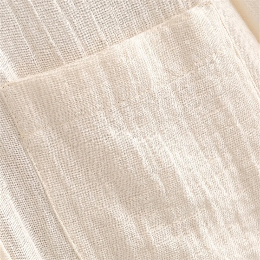 2020 summer new women's solid color lapel pocket decoration texture lazy casual loose version of the long shirt shirt