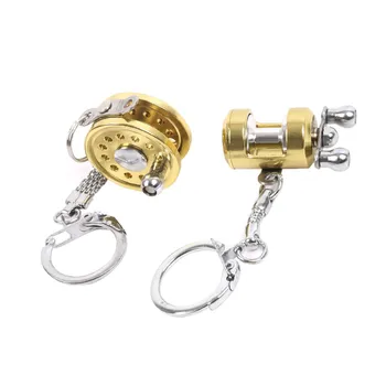 

Fancy&Fantasy Fish Wheel keychain Gold Color Fly Fisherman Spinning Fishing Reel Charactor Miniature outdoor tools