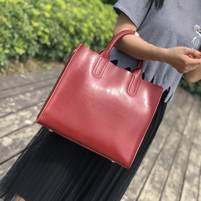 

Leather Large Bag Lady Simple Oil Vertical Version of The Hand-held Shoulder Slant Bag