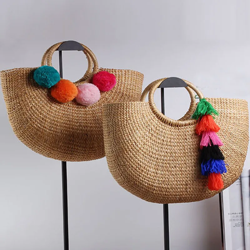 wicker beach bag with pom pom