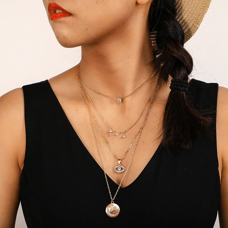 

HuaTang Boho Gold Eye Carved Star Shining Crystal Pendant Necklaces for Women Multi-layer Charm Chains Necklace Jewelry E03110