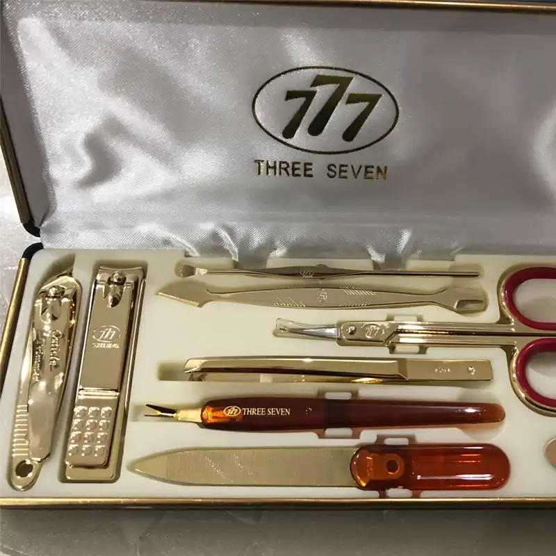 three seven manicure set gold