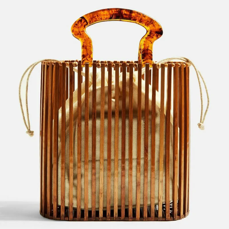 

2020 spring and summer woven female bag fashion beach straw woven bag simple acrylic handbag