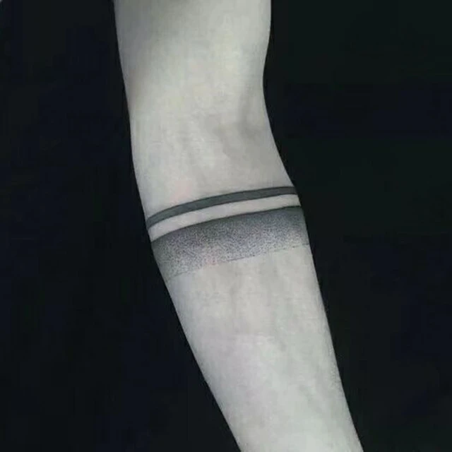 Minimalistic circle tattoo done on the inner forearm.