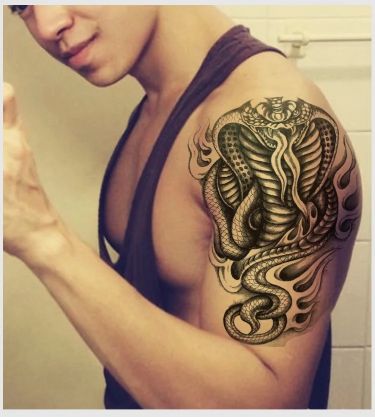 тату змеи на плече женские. татуировки змей на плече. татуировки змей на плече. тату перекрытие змеи. тату на плече змея для мужчин.