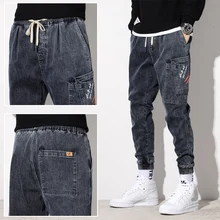 Pantalones vaqueros negros para hombre, pantalón holgado informal de herramientas para primavera y otoño, con pie de haz de nueve puntos, talla grande