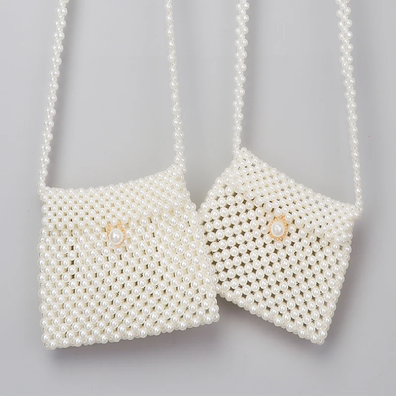 

Handmade beaded dumplings pearl bag woven Korean version of the small pockets shoulder diagonal phone female clutch coin purse