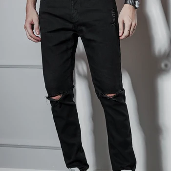 

British European and American high street hip-hop personality male triangle hole jeans black long pants slim feet pants skinny