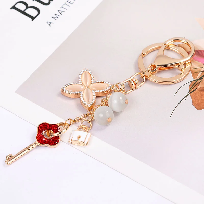 

New Crystal Key Chain Rhinestone Clover Car Keyrings Female Creative Cute Flower Bag Pendant Key Rings keychain